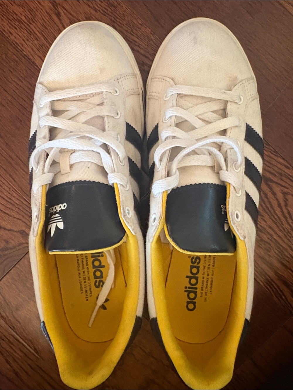 adidas White Canvas Sneakers with Black Stripes and Yellow Lining